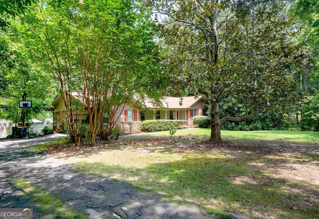 Photo of 100 Melody Lane, Fayetteville, GA 30215 (MLS # 10822403)