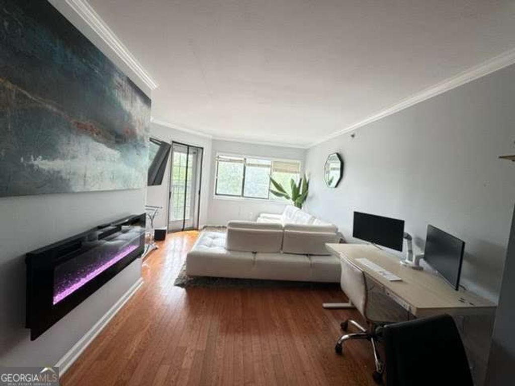Photo of 795 Hammond Drive #406, Atlanta, GA 30328 (MLS # 10758139)