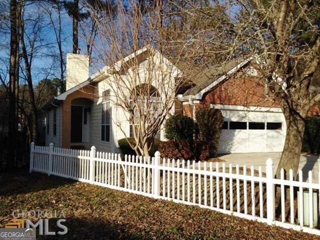 Available approx Feb 10th or slightly before. **White fence in picture is no longer there.*** Wonderful 3 bedroom ranch with open floorplan & in excellent condition. LVP hardwood flooring throughout most of home including vaulted family room with fireplace & ceiling fan. Kitchen and dining area have tile flooring, granite counters & all appliances including the refrigerator (ice & water) gas range, built-in micro & DW. Good sized primary suite has a walk-in closet, bath with dual vanities, garden tub & separate shower. Excellent schools! (Oak Grove Elem, Rising Star Middle & Starr's Mill High) And just a short drive or golf cart ride to all of Peachtree City's fantastic amenities. Please call office for appt.