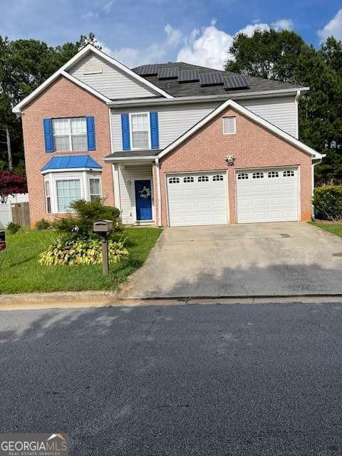 Welcome to this charming brick front two-story home. Great room features a fireplace and very high ceiling. Formal dining, spacious kitchen with S/S appliances. Large master suite with walk-in closet, Soaking tub and separate Shower. Storage area in rear. Large private fenced-in backyard. This is a Short Sale, Subject to lenders approval.