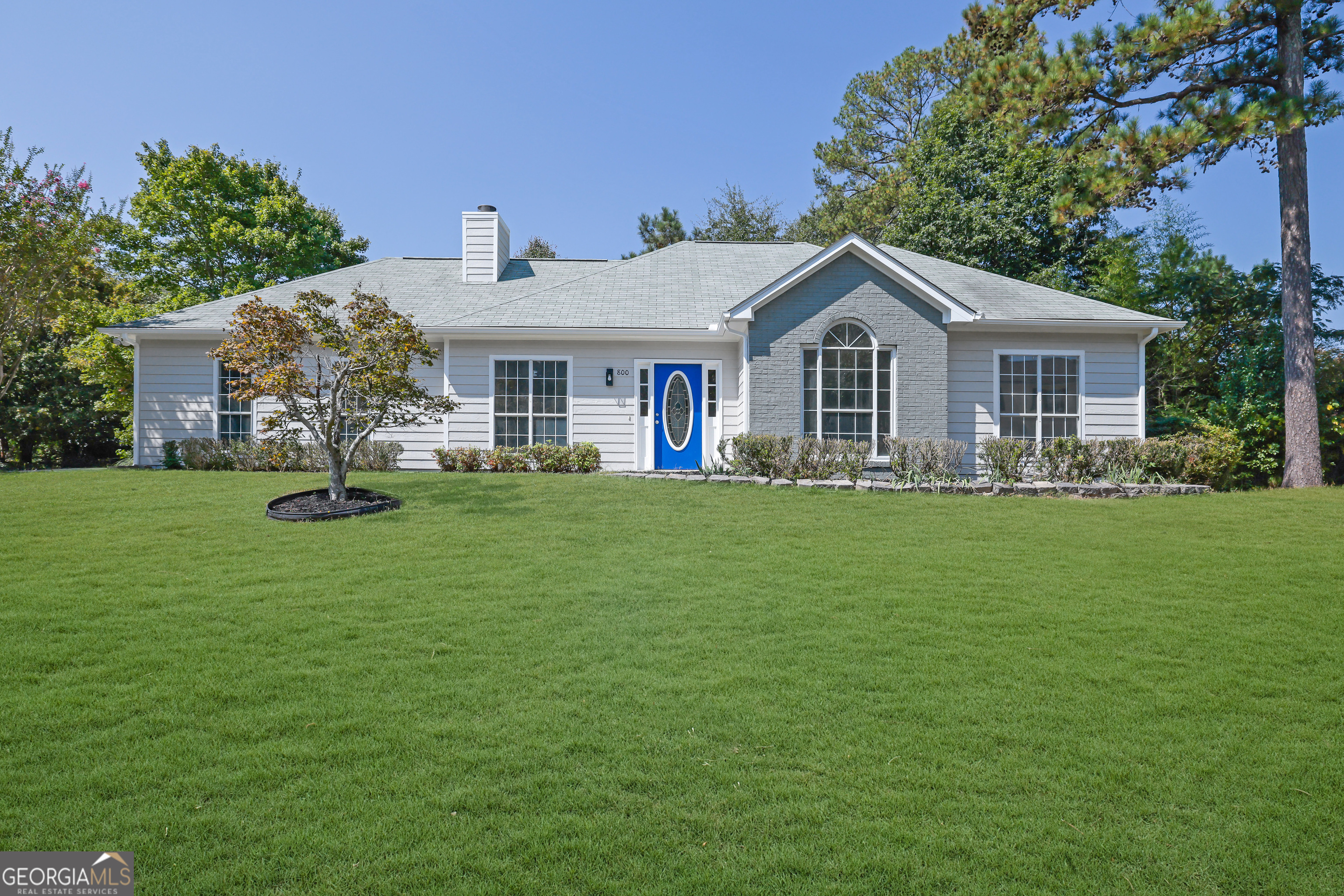 Charming 3BR/2BA ranch on a spacious corner lot in Westmill Creek. The inviting family room with fireplace opens to the dining area and kitchen featuring granite countertops and classic cabinetry. Fresh paint, updated flooring, and modern fixtures throughout. A beautiful sunroom with abundant natural light overlooks the backyard-perfect for relaxing or entertaining. Primary suite with private bath plus two secondary bedrooms and full hall bath. Large fenced yard, two-car garage, and convenient Marietta location near shopping, dining, schools, and major highways. Full of charm and move-in ready-make this property your home!