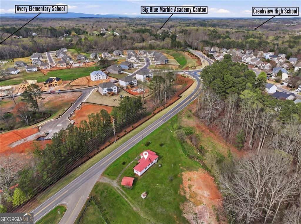 Photo of 7232 E Cherokee Drive, Canton, GA 30115 (MLS # 10715456)