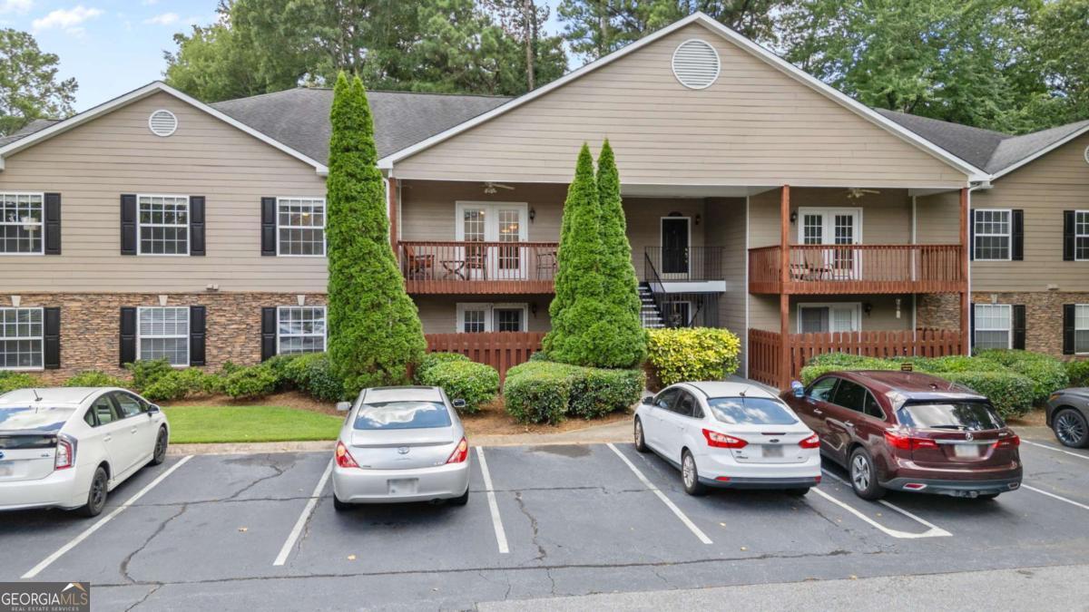 Nestled in the gated Elizabeth Heights community of Sandy Springs, this upper level 3 bed/2 bath condo is move-in ready with updated kitchen, fresh paint and new carpet with upgraded padding. Convenient walkable access to shopping, dining, schools, public transportation, and recreational areas. Spacious kitchen with stainless steel appliances and renovated laundry room. Large walk-in storage closet off the dining area. The exterior covered deck is perfect for entertaining or relaxing. This well-managed community includes a saltwater pool, groundskeeping, clubhouse, numerous dog stations, gated entry, internet, cable, pest control, water, sewer, and waste.