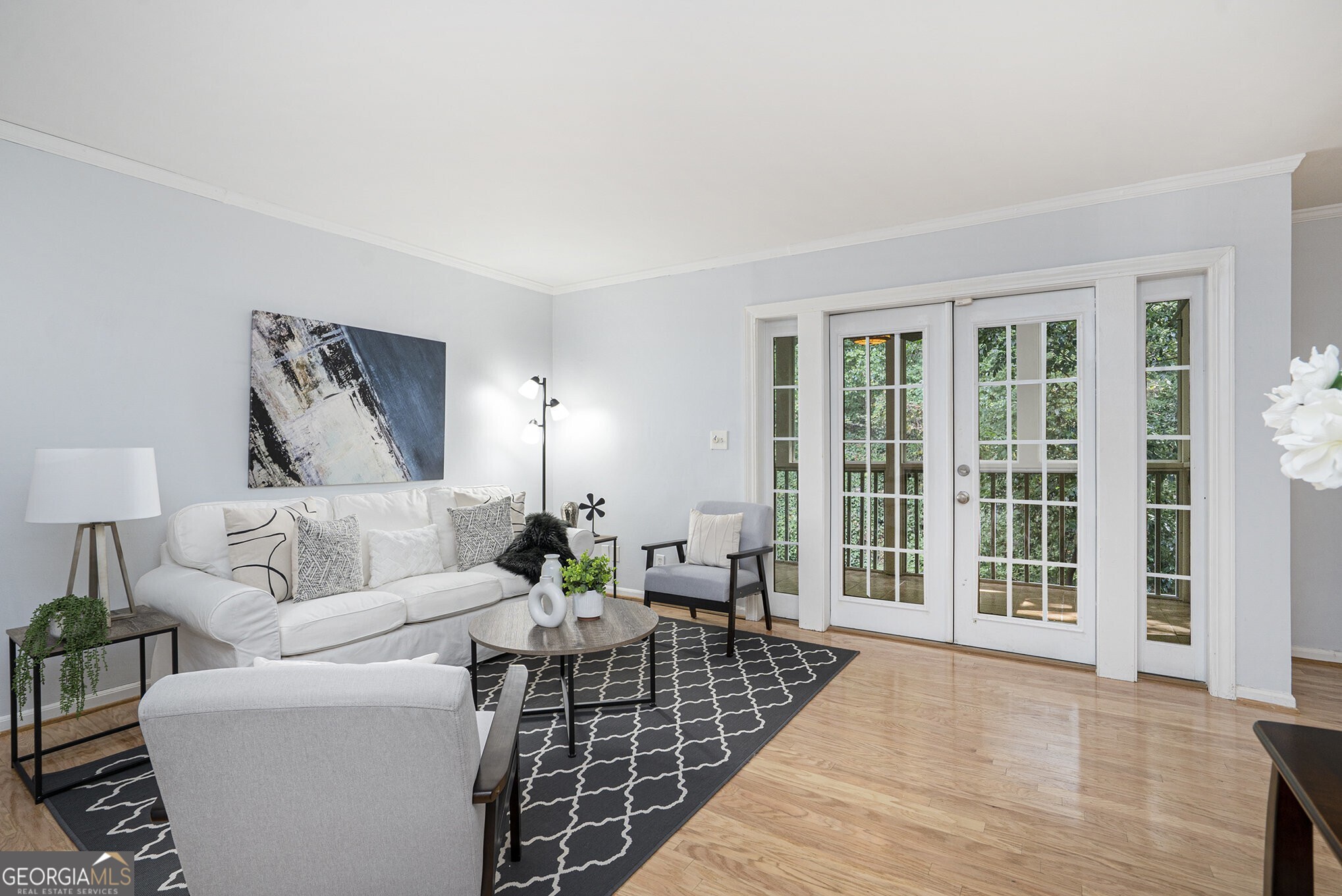 Prime Morningside Location in Carlyle Heights! Live in the heart of it all with this beautifully maintained Condo in Carlyle Heights, perfectly positioned just Steps from Piedmont Park, the BeltLine, Dining, Shopping, Playgrounds, Dog Parks, Grocery Stores, Gyms, and more. Hardwood Floors flow seamlessly from the Light-Filled Family Room, complete with French Doors to your Private Balcony, into the open Dining Room. The adjacent Kitchen features White Cabinets, Granite Counters, Stainless Steel Appliances, a Built-In Pantry, and a Breakfast Bar ideal for everyday living and entertaining. Enjoy Two Spacious Bedrooms, including a Primary Suite with a Private Bathroom. The Secondary Bedroom is served by a Hall Bathroom, providing comfort and flexibility for everyone. The community itself is a true retreat, featuring a Gated Pool, Private Green Space, Gazebo, Dog-Friendly Walking Trails, and plenty of Guest Parking. With a Quick Commute to Midtown, Downtown, Emory, Buckhead, and the CDC, this home offers the perfect blend of location, lifestyle, and ease.
