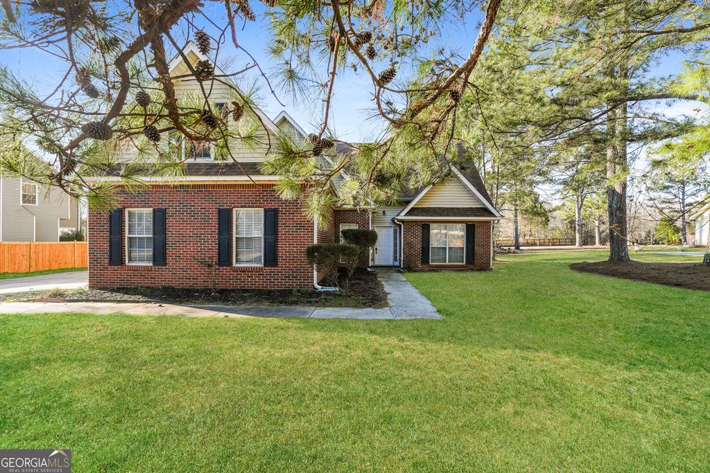 Photo of 124 Wayne J Stokes Boulevard, Stockbridge, GA 30281 (MLS # 10680806)