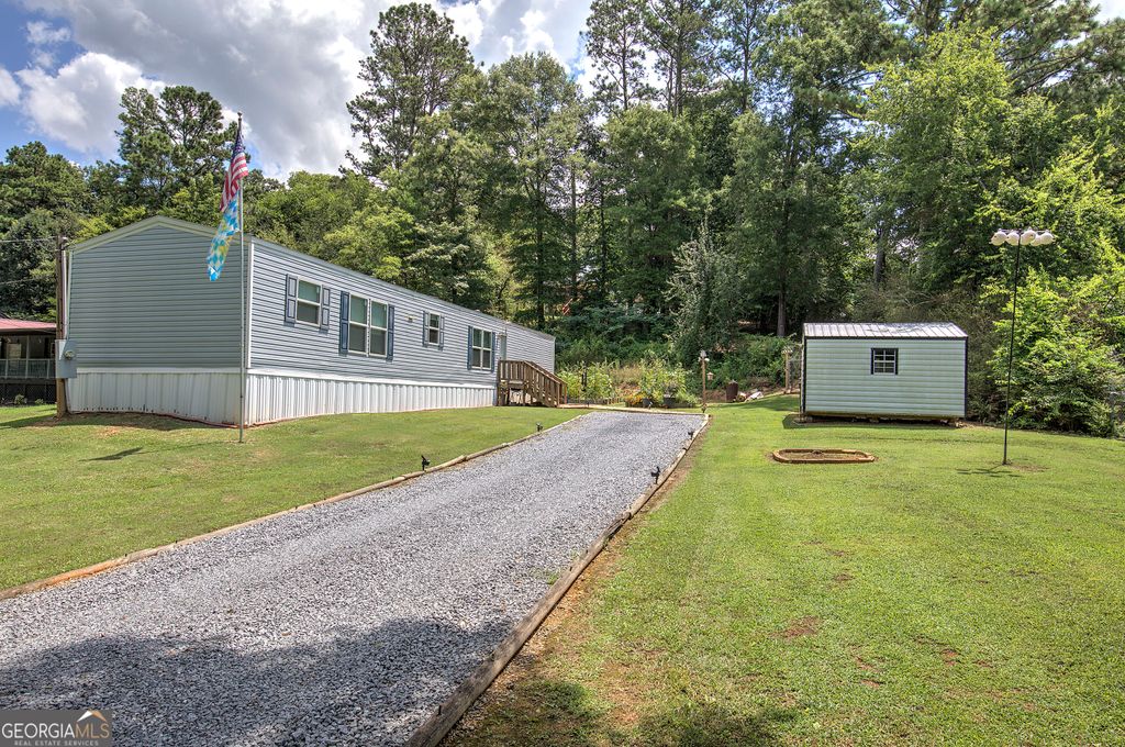 Photo of 115 Webberdale Drive SW, Plainville, GA 30733 (MLS # 10809425)