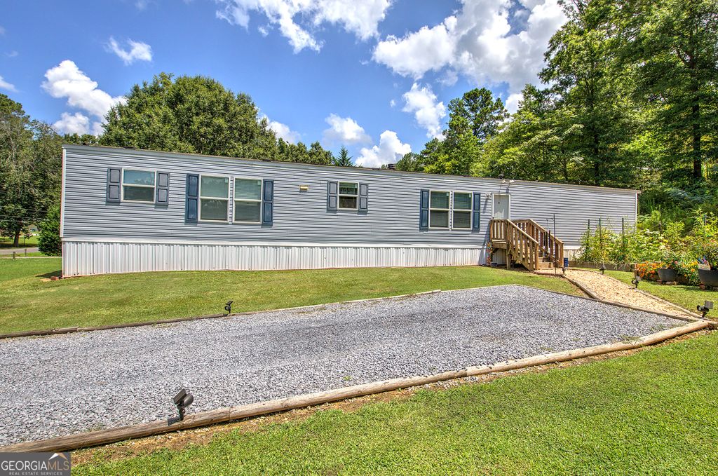 Photo of 115 Webberdale Drive SW, Plainville, GA 30733 (MLS # 10809425)