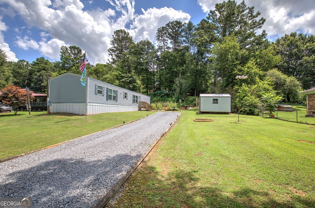 Photo of 115 Webberdale Drive SW, Plainville, GA 30733 (MLS # 10809425)