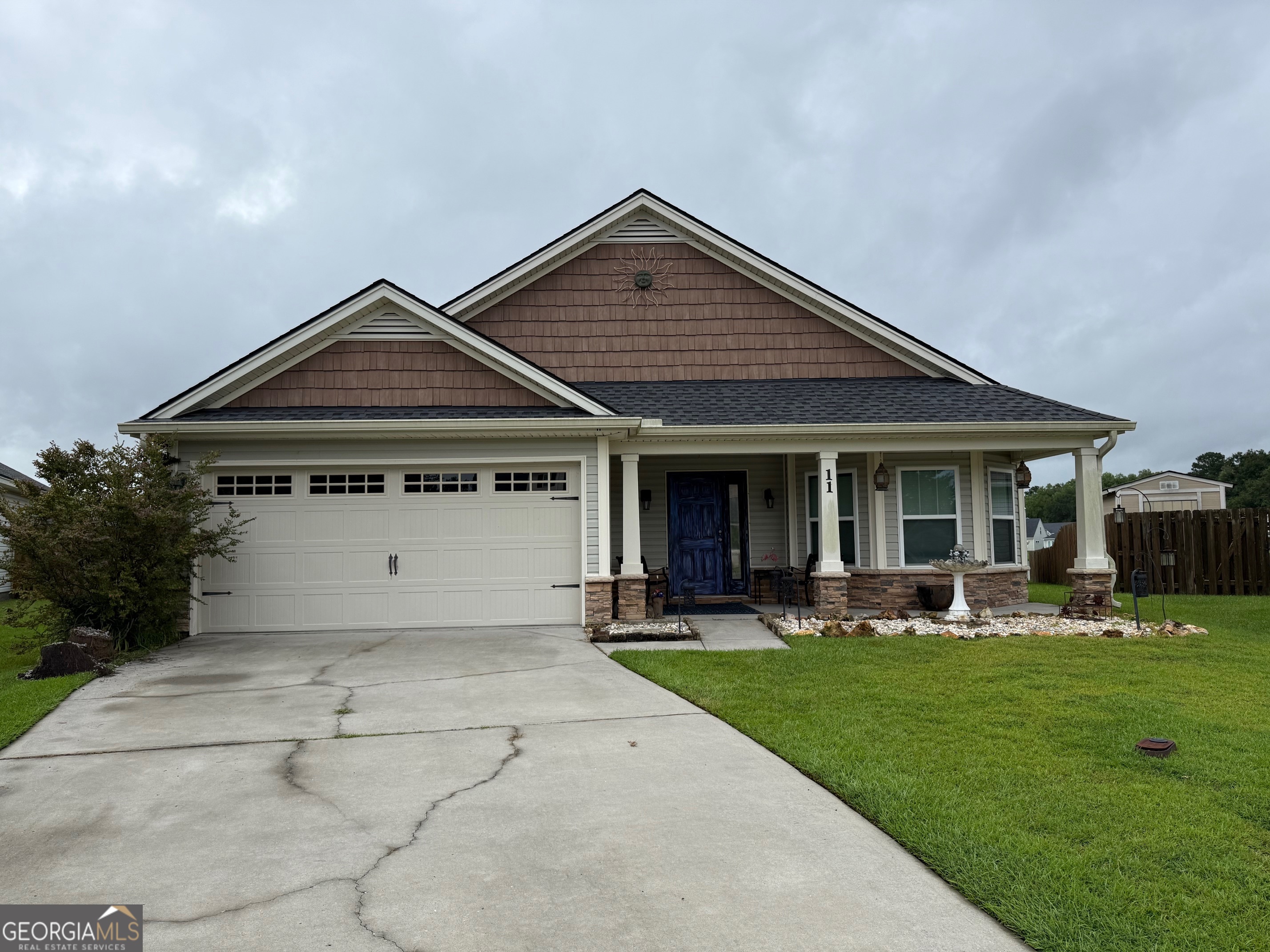 HUGE price reduction!! Motivated seller!! Looking for quick close. Welcome to this spacious 3 bedroom, 2 bathroom home with over 2,000 sq. ft. of living space in the desirable Lakeshore subdivision of Port Wentworth. One of the larger models, this home is tucked away in a quiet cul-de-sac. The location offers both comfort and convenience with an easy commute to Savannah, Pooler, and quick access to I-95 and I-16. Inside, you'll love the open floor plan featuring granite countertops, solid wood cabinets, and a barstool-height counter that flows between the kitchen and dining area. A separate dining room provides additional space for entertaining, while the upstairs bonus room is perfect for a home office, playroom, or guest space. The primary suite and secondary bedrooms are thoughtfully designed for privacy and relaxation. Outdoors, enjoy tranquil lake views from your screened-in porch or step out to the paver patio for backyard gatherings. The home also includes a welcoming front patio and a 2-car attached garage. Don't miss this opportunity to own a beautiful home in a great location with serene lakefront living! One block from playground. Seller willing to pay for home warranty.