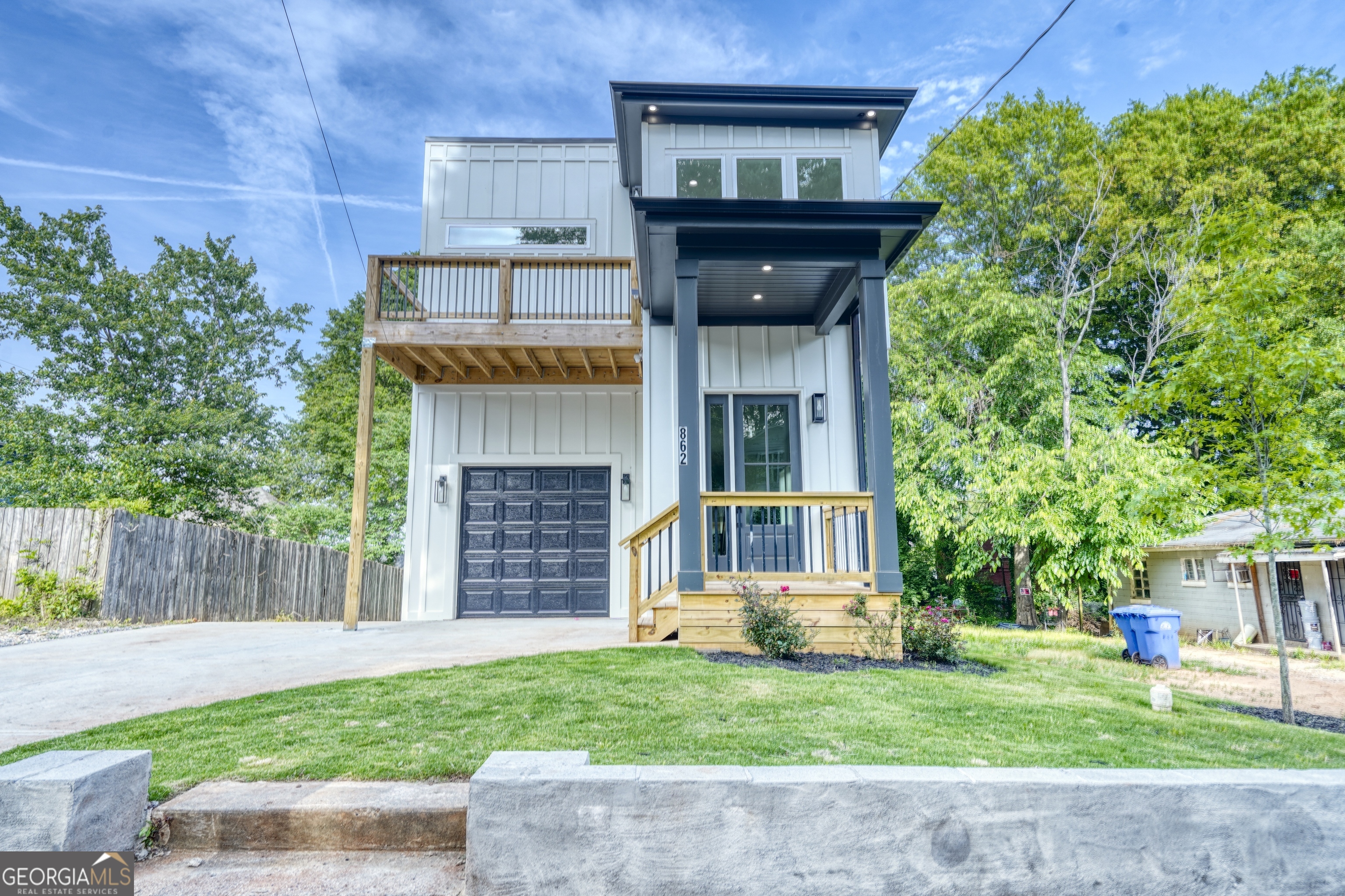 Welcome to this brand-new modern home in the heart of Atlanta's vibrant Pittsburgh neighborhood. Thoughtfully designed with high-end finishes, this home offers both style and function throughout. The spacious owner's suite features a private tiled deck, spa-style bathroom with dual-head shower, double vanity, and a large walk-in closet. Two additional bedrooms each include walk-in closets and share a beautifully finished full bath. All bathrooms include custom Marfa Cabinet vanities, quartz countertops, and modern lighted mirrors. Smart home features include a Ring doorbell, Nest thermostats, Modern Forms Smart Fans, LED lighting, and an energy-efficient electric water heater. Located within walking distance of Pittsburgh Yards and the Beltline, and just minutes from Georgia State, Clark Atlanta, Spelman, Mercedes-Benz Stadium, the Georgia Aquarium, and downtown shops and dining. Quick access to I-20, I-75/85, and Hartsfield-Jackson Airport. Don't miss your chance to own this striking new home in one of Atlanta's fastest-growing communities. Schedule your tour today.