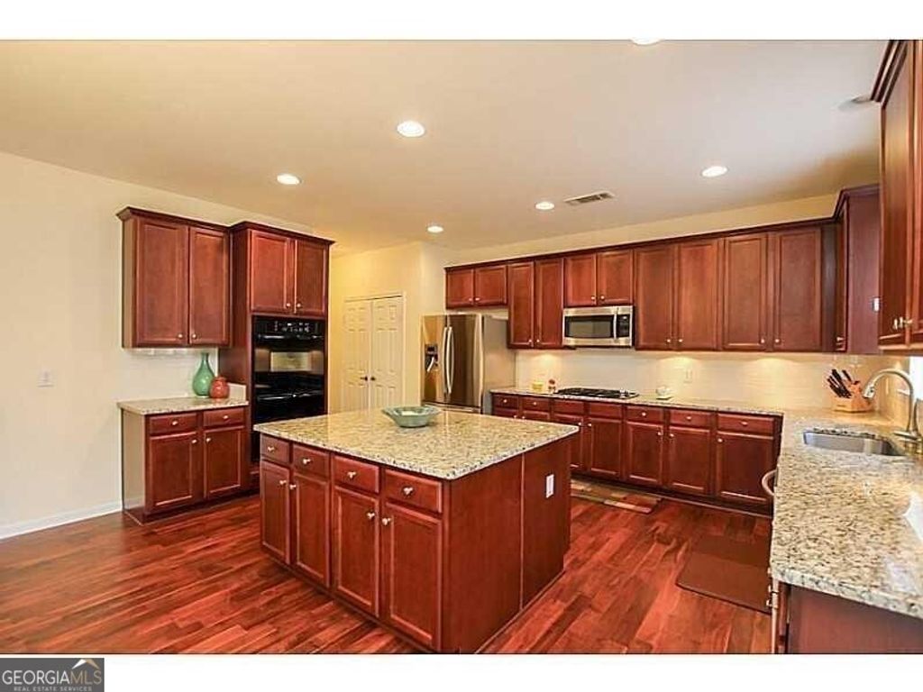 Photo of 1277 Sailwind Court, Buford, GA 30518 (MLS # 10790145)