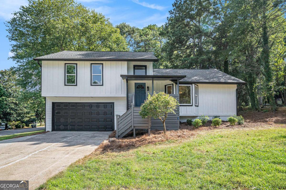 Better than New! Stunning Renovation one mile from all the action on Canton Street in downtown Roswell! A beautiful 2-story foyer welcomes guests. Open floor plan! Entertain in the amazing Chef's Kitchen with large island, Granite Countertops, Stainless Appliances, that opens to the vaulted fireside Great room. Relax on the Screened Porch or new Deck overlooking a Gorgeous large flat park like backyard. Spacious guest Bedroom on Main, great for an office, full bath with newly tiled shower. Gorgeous Master Bathroom with tiled Shower and floor, double vanity and Soaker tub. The home features new Siding, Windows, HVAC, Interior/Exterior Paint, New Lighting/Pluming Fixtures, New Carpet and LVP; replaced all exterior lights and added motion sensor lights to front and back corners of the home. New pex plumbing throughout!