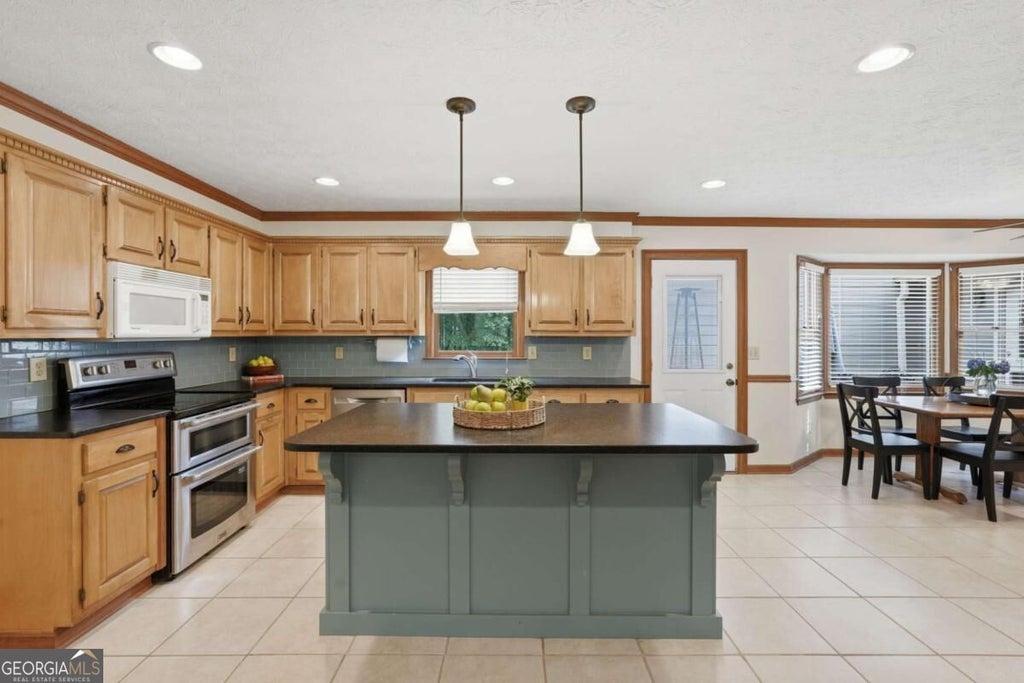 Photo of 4891 Bill Cheek Road, Auburn, GA 30011 (MLS # 10842288)