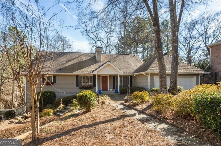 Discover lake living at its finest in this exceptional residence, ideally located in the highly sought-after Sandy Springs/Dunwoody area. Upon entering, you're welcomed into a foyer that leads into a vaulted, fireside family room?perfect for both everyday living and entertaining. The gourmet kitchen is outfitted with granite countertops and stainless steel appliances, including a gas cooktop, wall oven/microwave, and dishwasher. A large dining room sets the stage for memorable gatherings, while the expansive vaulted sunroom offers breathtaking views of the tranquil lake. The main-level primary suite is a true retreat, featuring a cozy sitting area, French doors leading to the rear deck, and a spainspired ensuite bath with double granite vanities and a tub/shower combination. Upstairs, you'll find two spacious bedrooms?each with private porches?and two full bathrooms, providing comfort and privacy for family and guests. The fully finished terrace level is an entertainer?s dream, complete with a fireside family room, second full kitchen, full bath, office/bedroom, and sunroom. Step outside to a large deck with a dry-below system, perfect for year-round enjoyment. The professionally landscaped grounds are a private oasis, showcasing two serene Koi ponds, a garden shed, a bench swing, and a stationary deck by the water?s edge. The entire lot is enclosed with elegant wrought-iron fencing and a gated driveway for added security and curb appeal. An oversized two-car garage completes this extraordinary offering. This property is listed below value and being sold AS IS needs paint, flooring, and some cosmetic updates. We welcome all offers and are welcome to inspect the home. It is a great house just needs some cosmetic updates.