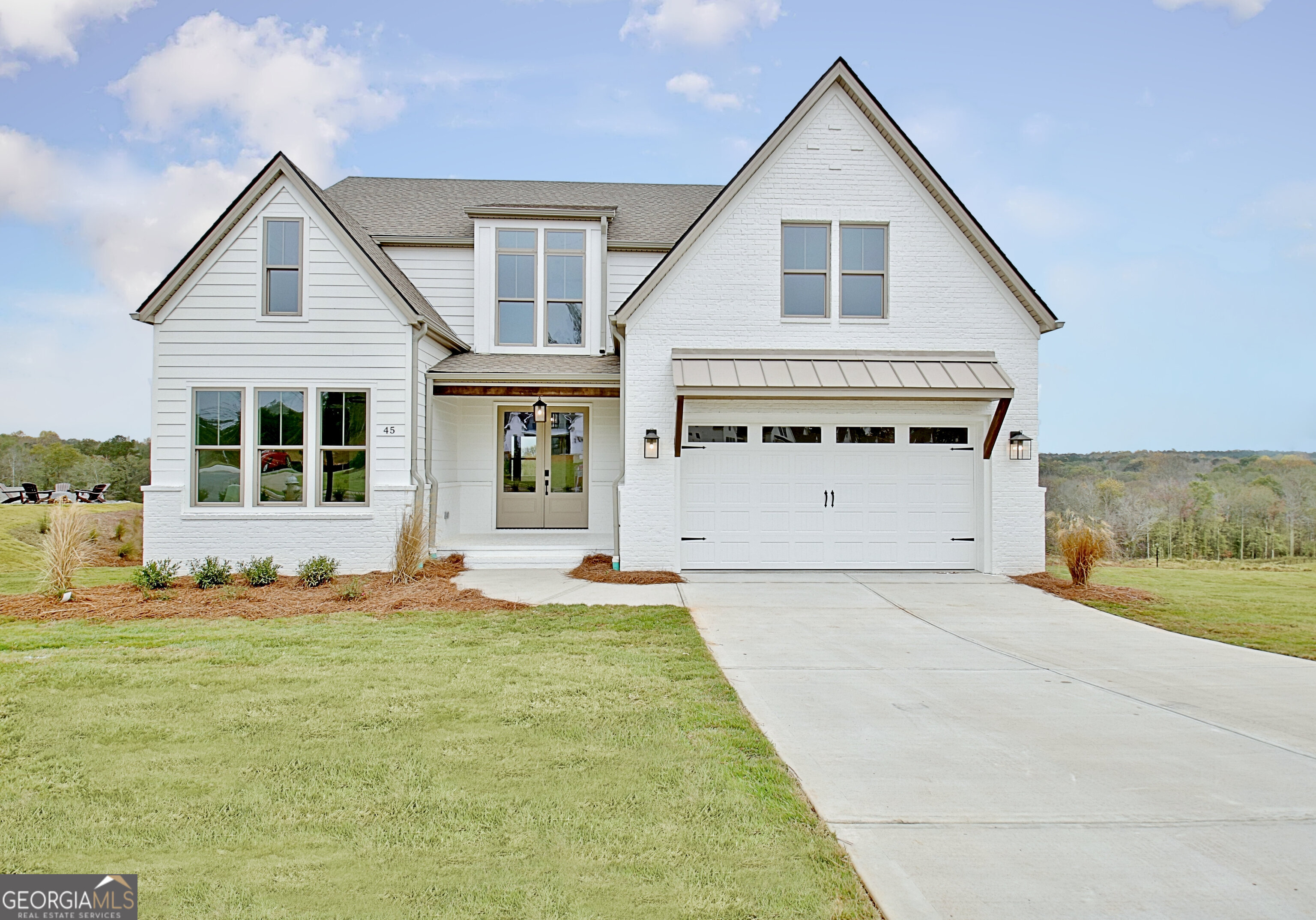 BUILDER'S BUYER INCENTIVE ON THE LAST 3 BASEMENTS IN KEG CREEK LANDING: UP TO $30,000.00 TOWARDS BUYING DOWN YOUR INTEREST RATE PLUS OUR LENDER'S INCENTIVE OF 2% TOWARDS THE CLOSING COSTS FOR QUALIFIED BUYERS! Visit This Beautiful Custom Built Barentine Downing Construction, Inc. House and Come Home! This Home has a 2 Car Garage. Enjoy this warm and inviting covered front porch with Tongue and Groove Ceiling and Brick Pavers on the Porch. This home also has a Covered Back Porch with Tongue and Groove Ceiling which overlook the amazing tree line on the horizon as well as the Zoysia Sodded Yard with Sprinkler System. As you enter the Front Door, there is a Guestroom and Full Bathroom for your guests on the Left and as you move towards the Great Room there is a Spacious Laundry Room with a Window and beautiful Cabinets. This plan has the Primary Bedroom on the Main, with a Spacious Closet, Private Toilet Room, a separate Shower, Slipper Tub and two separate Vanity Cabinets with Sinks as well as a Linen Closet. The Open Concept Great Room with Fireplace overlooks the Kitchen with Breakfast Room, a Spacious Island. The Kitchen has Stainless Steel appliances which include a Gas Stove, Microwave, and Dishwasher. The island has a Ceramic Farmhouse Sink and Large Pantry with Coffee Bar Area. The Upstairs has 3 Bedrooms and 2 Full Bathroom with additional storage areas. Our Builders have kept the Buyers in mind with features such as a Tankless Water Heater, Natural Gas, High Speed Internet, Foam Insulation in the Rafters, Sprinkler System front and backyard with Zoysia Sod. The Kitchen and Bathrooms also feature Quartz Countertops. The community has outdoor activities which include swimming, pickleball courts, golf cart access to Senoia by Seavy Street and also through the wetland bridges. Visit this House and Come Home!