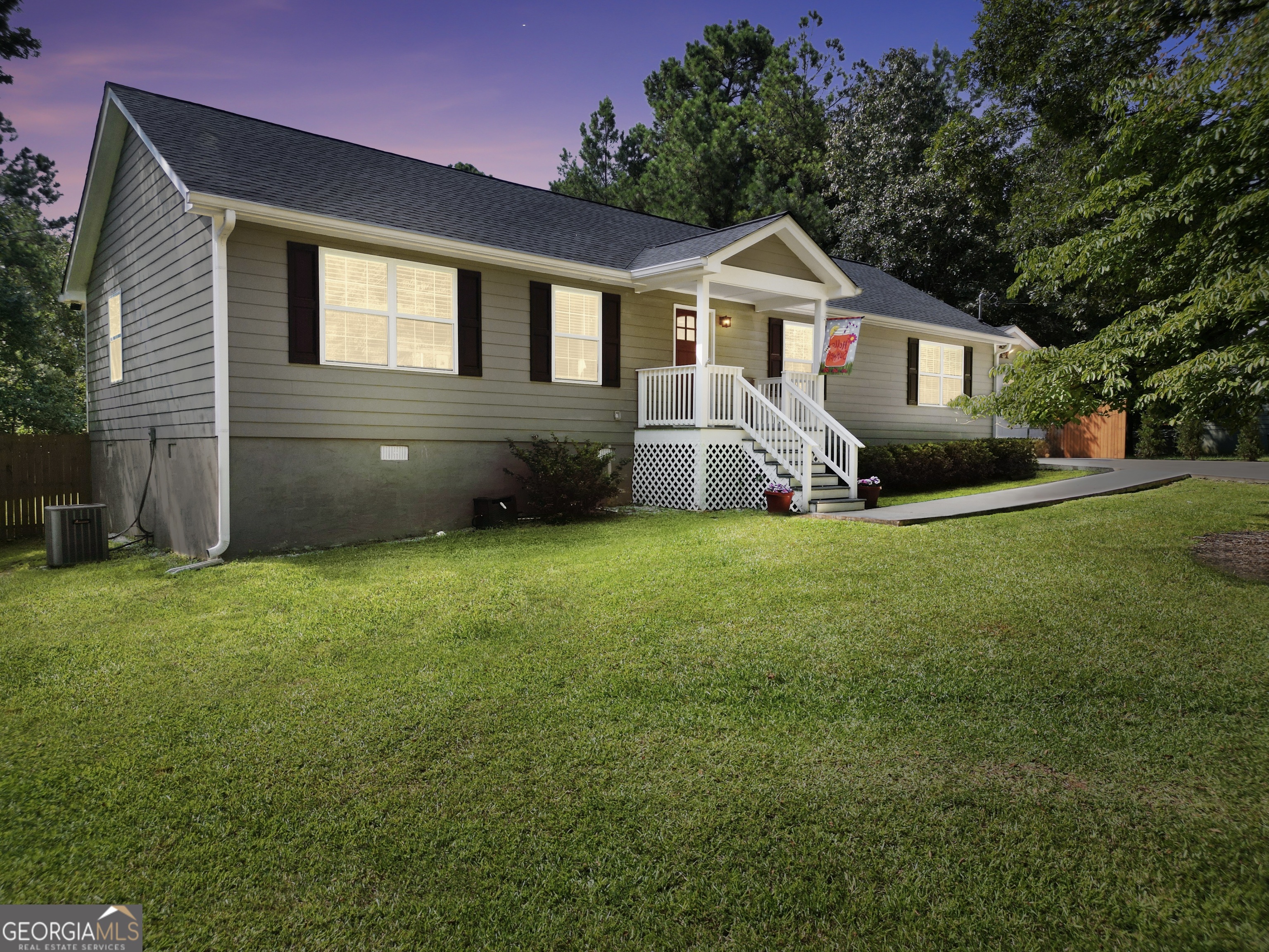 Well-maintained home just 1.5 miles from Long Shoals boat ramp on Lake Oconee. Features include LPV flooring throughout, crown molding, and a spacious open floor plan. Kitchen offers a farm sink, granite countertops, stainless steel appliances, pantry with automatic light, and all appliances including washer/dryer remain. Primary suite includes a jacuzzi tub and glass shower. Baths feature ceramic tile. Enjoy outdoor living with a screened porch overlooking the large deck and 18x33 pool with 7' deep end. Backyard is fenced for privacy. Additional features: 2-car garage with automatic opener, 20x24 shop with attic storage + 11x16 storage room, paved driveway, fairly new roof, Water filtration system and an automatic attic air circulation system. This property combines comfort, storage, and outdoor amenities on a 1-acre lot close to Lake Oconee.
