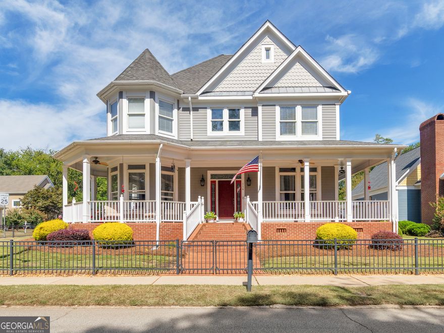 Charm Meets Modern Luxury - Steps from the Town Square!  Welcome to 114 Bryan, a beautifully appointed residence where timeless Southern architecture blends seamlessly with high-end modern amenities. Perfectly situated just a short stroll from the vibrant McDonough town square, this home offers the ideal balance of privacy, convenience, and luxury living. Step onto the expansive wrap-around porch, ideal for morning coffee or evening gatherings, and into a home that's both elegant and functional. Inside, you'll find a chef's dream kitchen featuring stainless steel, commercial-grade appliances, including a trash compactor, ice machine, and abundant prep space. Every detail has been thoughtfully designed for both entertaining and everyday living.  The oversized primary suite is a true retreat, with a spa-inspired ensuite bath featuring LED mirrors, a luxurious soaking tub, and a walk-in shower. The laundry room is conveniently connected to the master suite and includes a custom folding counter for added function and style.  Additional highlights include:  Private fenced patio for your enjoyment  Underground outdoor hose bibs and mature landscaping  Dedicated home office space, perfect for remote work or study! Spacious game room, ideal for entertaining friends and family! Gorgeous architectural details throughout, preserving the home's character while offering modern comfort! This exceptional property offers walkability, privacy, and luxury in one of McDonough's most desirable locations. Don't miss the opportunity to make 114 Bryan your forever home.