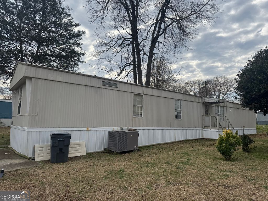 Photo of 521 Bay Creek Crossing # 521, Loganville, GA 30052 (MLS # 10720460)