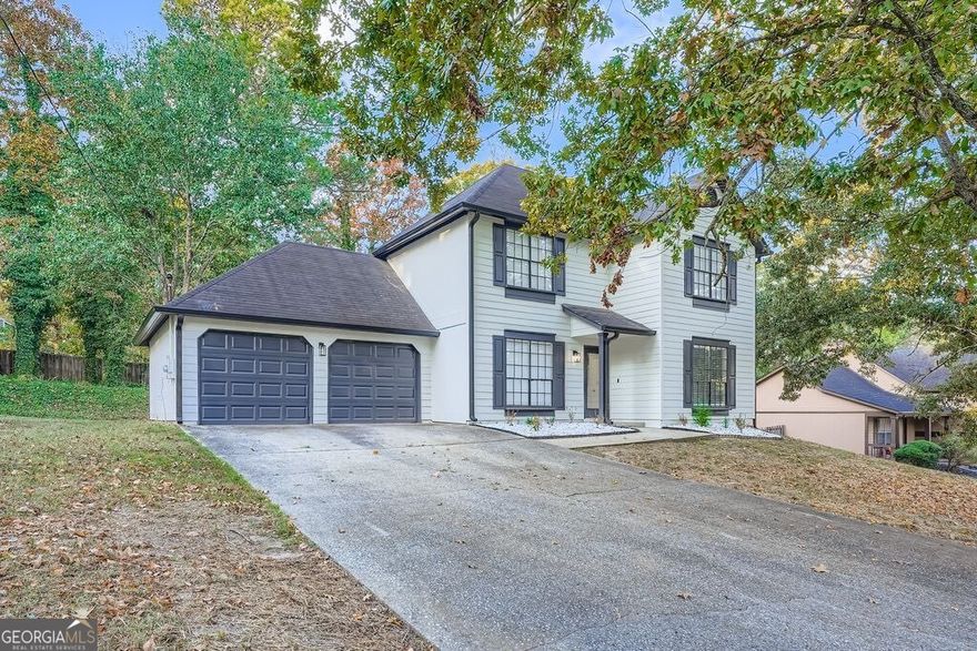This move-in ready 3-bedroom, 2.5-bath home combines modern style with everyday convenience - just 15 minutes from the airport and 5 minutes from shopping, schools, and dining.  Step inside to a bright, open floor plan featuring updated finishes and a stylish half bath on the main level. Upstairs, the spacious primary suite offers a renovated ensuite complete with double vanities, a soaking tub, and a separate shower. Two additional bedrooms and a full bath provide comfort and versatility for guests, family, or a home office.  Set on a generous lot with no HOA, this property offers room to expand, garden, or simply enjoy outdoor living.  Incentives available with preferred lender - seller is motivated!