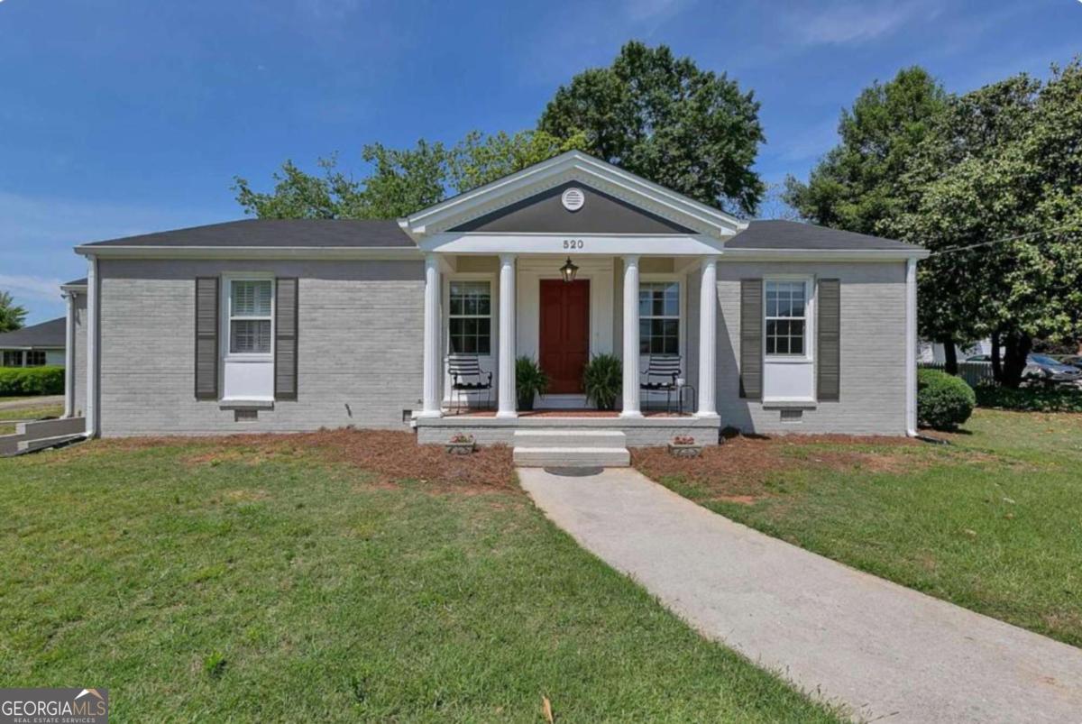 Updated 4-Bedroom Home in the Heart of Downtown Lawrenceville - Rental, Office, or Live/Work Potential. Welcome to this beautifully updated 4-bedroom, 2-bathroom home located on South Perry Street in the heart of downtown Lawrenceville. This versatile property offers the perfect blend of comfort, functionality, and location: ideal as a primary residence, short or long-term rental, professional office space, or live/work setup. Just 0.4 miles off the city square, you're within easy walking distance to great restaurants, coffee shops, and local boutiques - enjoy everything downtown Lawrenceville has to offer right at your doorstep. One of the standout features is the separate large garage with electricity and plumbed for a bathroom- offering endless possibilities. Whether you need a workshop, studio, storage, or want to convert it into a private office or guest suite, this space adds significant value and flexibility. Additional Highlights: Furniture negotiable. 16-18 miles to Stone Mountain Park & Historic Village. 23 miles to MARTA-Indian Creek Station. 28-31 miles to top Atlanta attractions like the Botanical Garden, High Museum of Art, Atlantic Station, and Fox Theater. Whether you're looking to live, invest, or work in a growing and vibrant community, this property delivers flexibility, space, and a prime location. Don't miss this opportunity - schedule your private showing today!