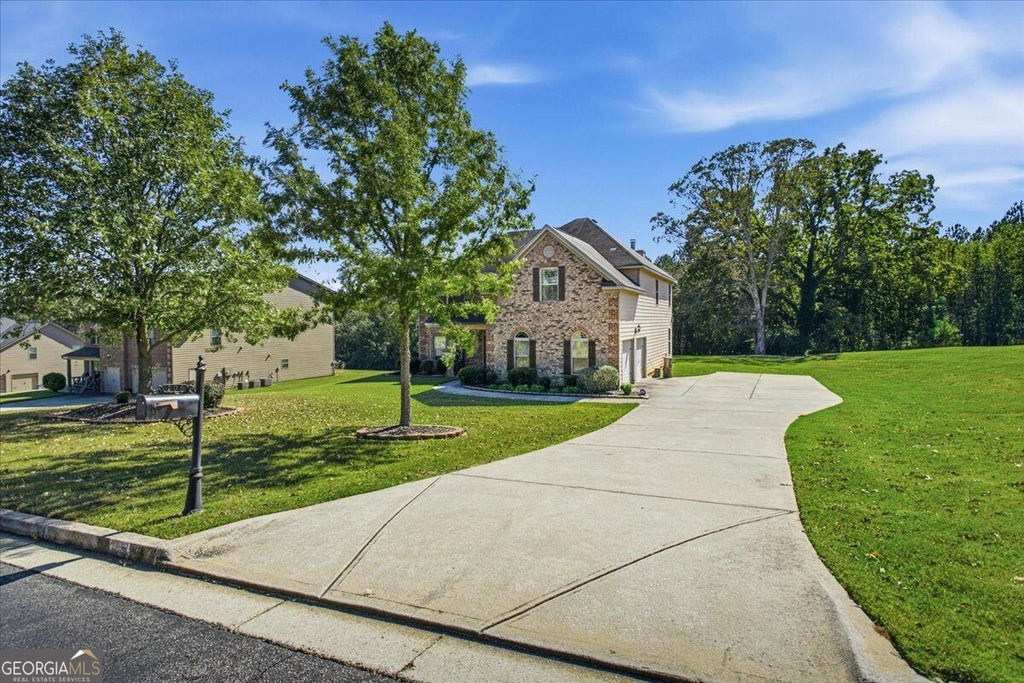Photo of 105 Shimmering Waters Lane, Fayetteville, GA 30214 (MLS # 10872727)