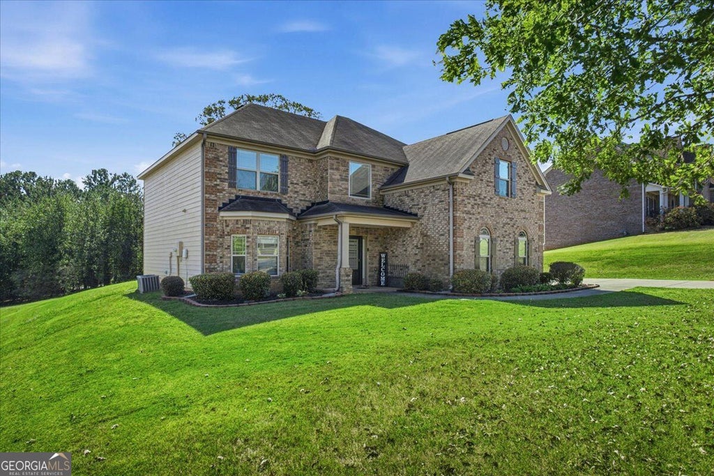 Photo of 105 Shimmering Waters Lane, Fayetteville, GA 30214 (MLS # 10872727)