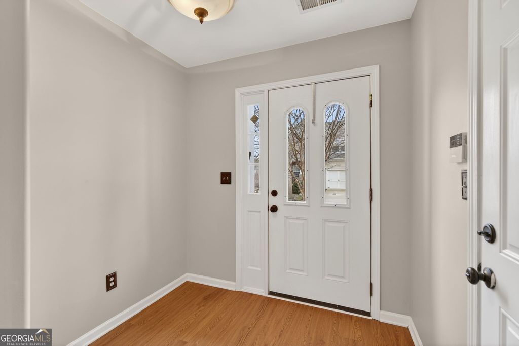 Photo of 1186 Lake Point Way, Suwanee, GA 30024 (MLS # 10699309)