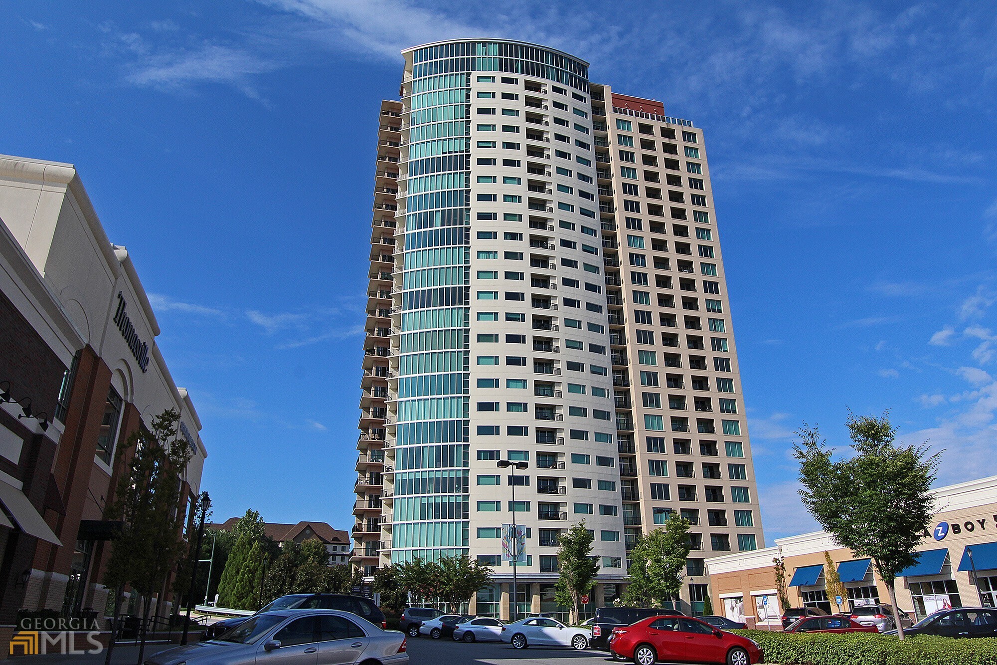 Location, Location, Location! You can't beat the fabulous southern view of the Atlanta Skyline and Stone Mountain city scape from your walk-out balcony on 16th floor of the Manhattan Condominiums! As a bonus, an open floor plan, we feature an open floor plan with two bedrooms, office with a view, stainless steel appliances, wood flooring, granite countertops in kitchen and baths, and two walk-in closets. Washer and microwave just replaced! Amenities: 2 assigned covered parking spaces, fitness center, pool, fabulous gardens with tennis/pickle ball court, pet walk and grilling area, Pool table, virtual golf and a 27th floor terrace view! Just outside the door, we have restaurants, shopping and more!