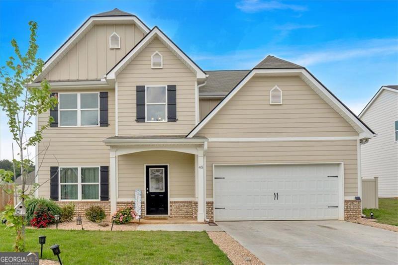 This spacious and well-maintained 5-bedroom, 3-bathroom home offers modern comfort and thoughtful design in a peaceful, family-friendly neighborhood. Step into a light-filled two-story foyer and enjoy an open-concept main level with a guest bedroom and full bath-perfect for visitors or multi-gen living. The kitchen features stainless steel appliances, ample cabinetry, walk-in pantry, and flows seamlessly into the dining and living areas. Upstairs, enjoy a generous primary suite with walk-in closet and spa-style en suite bath, plus three additional bedrooms and convenient laundry. Outside, the fully fenced backyard, fresh landscaping, and covered front porch provide both curb appeal and outdoor enjoyment. With a 2-car garage, solar accent lighting, and proximity to schools, shopping, and dining-this home is move-in ready. ?? Schedule your showing today!