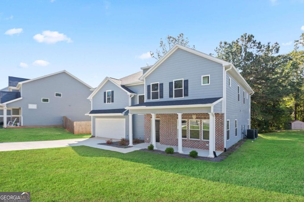 Photo of 250 Stonecreek Parkway, Covington, GA 30016 (MLS # 10654613)