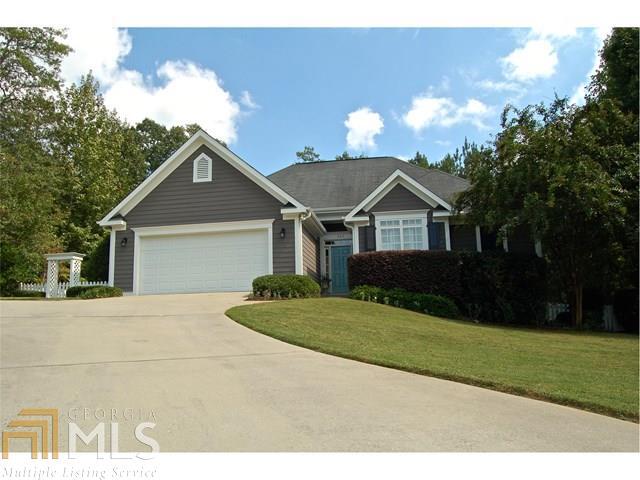 You will fall in love with the upgrades in this home in Lexington Estates! It will exceed your expectations at every turn! From new hardwood floors thru main & secondary bedrooms to new carpet in the Main! From new flooring in baths to tall baseboards giving a rich look & feel! The home has an open & bright split bedroom plan & master bedroom includes 2 spacious walk-in closets larger than you will see elsewhere! Master bathroom has a double vanity, shower, & garden tub. Enjoy sitting on the large deck that overlooks the fenced & landscaped backyard. There are plenty of trees & shade to relax & enjoy the outdoors. Convenient location on the eastside, near UGAs new Vet school. 100% financing possibly available through preferred lender. Ask Hank for details!