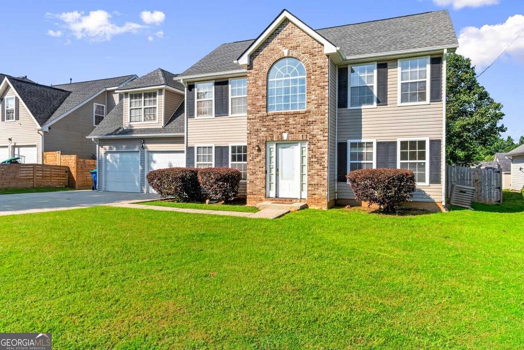 Photo of 6062 Lamp Post Place, Atlanta, GA 30349 (MLS # 10840600)