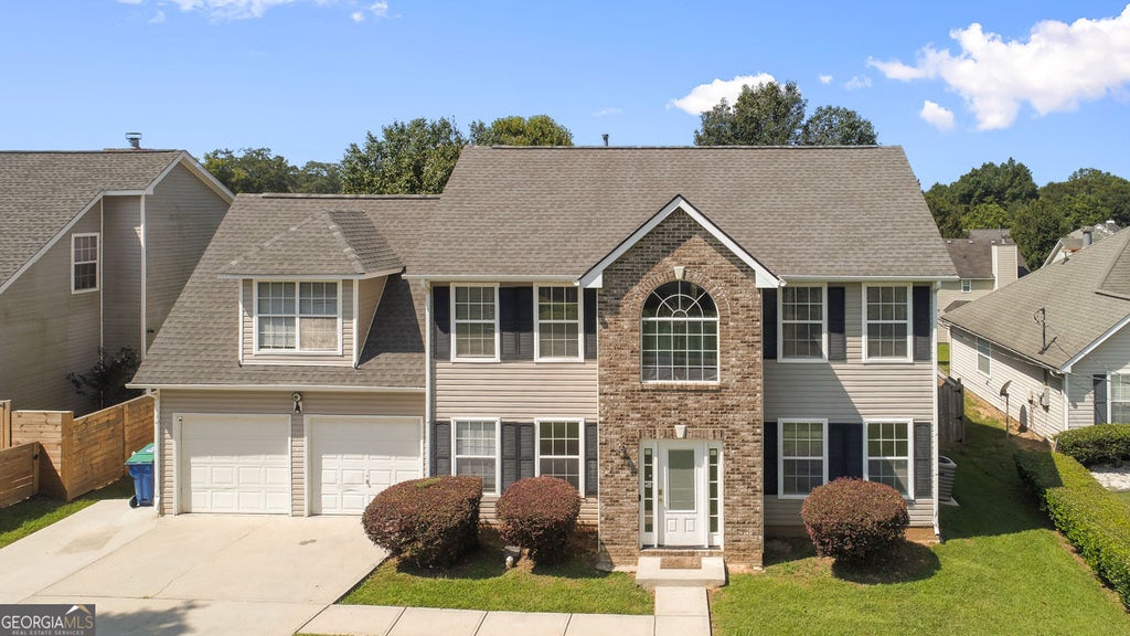 Photo of 6062 Lamp Post Place, Atlanta, GA 30349 (MLS # 10840600)