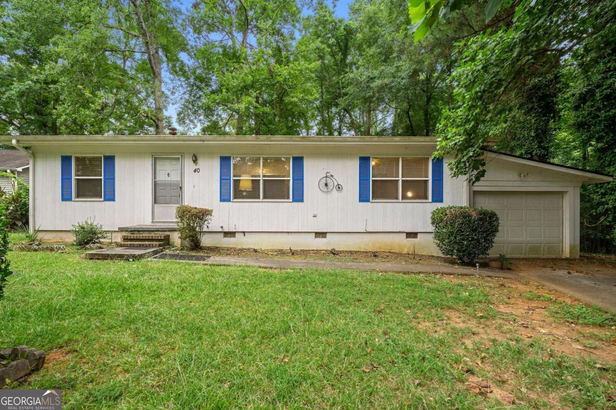 Welcome to 40 Sherwood Loop in McDonough, GA! This 3-bedroom, 2-bathroom ranch offers the perfect opportunity for a first-time homebuyer ready to add their personal touch or an investor seeking strong rental potential in desirable Henry County. The home features an attached garage, a roof replaced just 5 years ago, and a fully functional HVAC system also upgraded within the last 5 years-giving you peace of mind on the big-ticket items. With a solid layout and great bones, this property is priced to sell fast and offers tons of upside with a little sweat equity. Don't miss this chance to own in a growing area with great schools and easy access to shopping, dining, and highways!