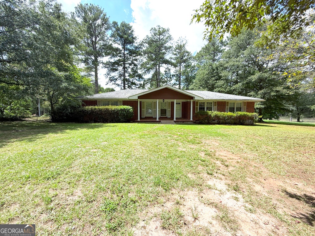 Photo of 1571 Ebenezer Road SW, Conyers, GA 30094 (MLS # 10836511)