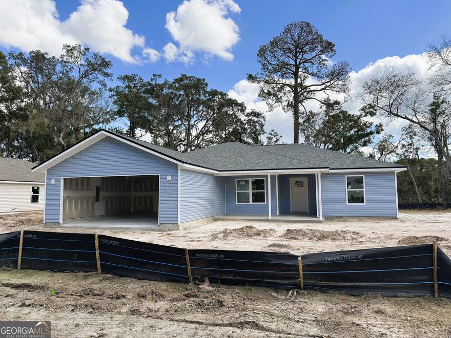 UNDER CONSTRUCTION NOW!  ENJOY BEAUTIFUL MARSH FRONT VIEWS FROM THOUGHTFULLY DESIGNED THREE-BEDROOM HOME FEATURING AN OPEN-CONCEPT LAYOUT AND MODERN FINISHES THROUGHOUT.  THE SPACIOUS KITCHEN INCLUDES A LARGE ISLAND WITH GRANITE COUNTERS, STAINLESS STEEL APPLIANCES, AND A BREAKFAST BAR OVERLOOKING THE LIVING AND DINING AREAS, EACH ENHANCED BY LUXURY VINYL FLOORING FOR EASY MAINTENANCE AND DURABILITY.  UNWIND IN THE PRIMARY SUITE, WHICH OFFERS A DOUBLE VANITY, PRIVATE WATER CLOSET, AND DUAL WALK-IN CLOSETS FOR PLENTY OF STORAGE.  THIS SPLIT FLOOR PLAN PROVIDES TWO ADDITIONAL BEDROOMS WITH CONVENIENT ACCESS TO THE GUEST BATH.  THE OVERSIZED INDOOR LAUNDRY ROOM INCLUDES A WALK-IN PANTRY, ADDING EVEN MORE FUNCTIONALITY TO THE DESIGN.  EXTERIOR FEATURES INCLUDE LOW-MAINTENANCE VINYL SIDING, A 30-YEAR ARCHITECTURAL SHINGLE ROOF, A COVERED FRONT PORCH, AND AN ATTACHED TWO-CAR GARAGE.  BUYER WILL RECEIVE UP TO A 2% CLOSING ALLOWANCE IF CLOSING WITH ONE OF SELLER'S PREFERRED LENDERS. **PHOTOS SHOWN ARE OF A FINISHED HOME FOR FLOOR PLAN REPRESENTATION ONLY. SOME FEATURES MAY BE OPTIONAL AND COULD INCUR ADDITIONAL COST.**