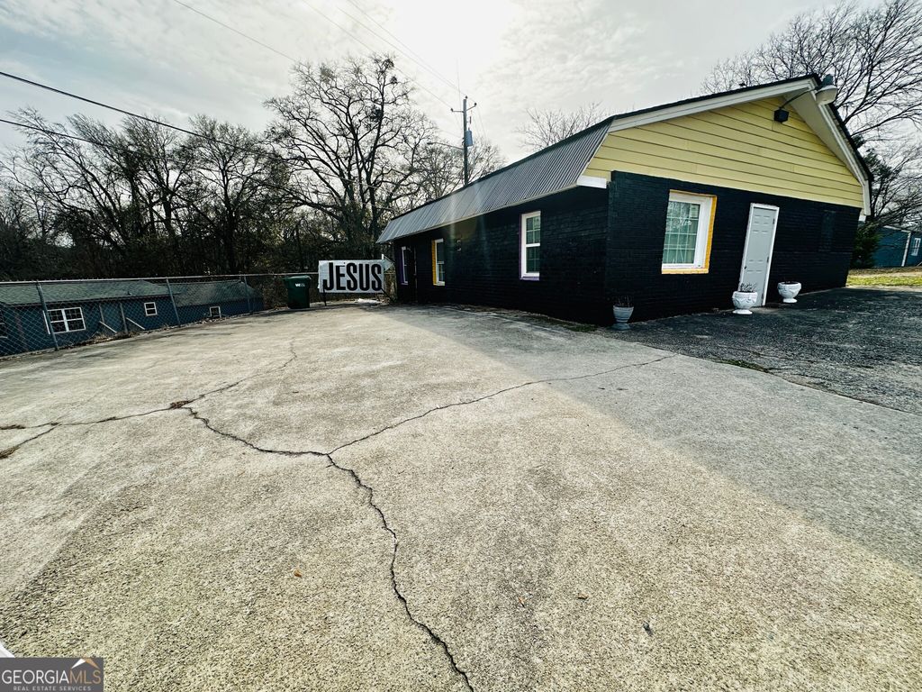 Photo of 5279 Springdale Road, Forest Park, GA 30297 (MLS # 10678481)