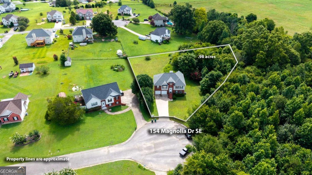Photo of 154 Magnolia Drive SE, Calhoun, GA 30701 (MLS # 10807641)