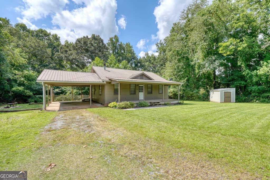 Photo of 723 Bugscuffle Road, Hiawassee, GA 30546 (MLS # 10819577)