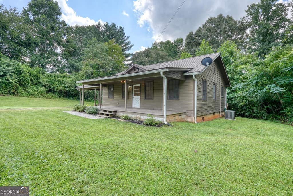 Photo of 723 Bugscuffle Road, Hiawassee, GA 30546 (MLS # 10819577)