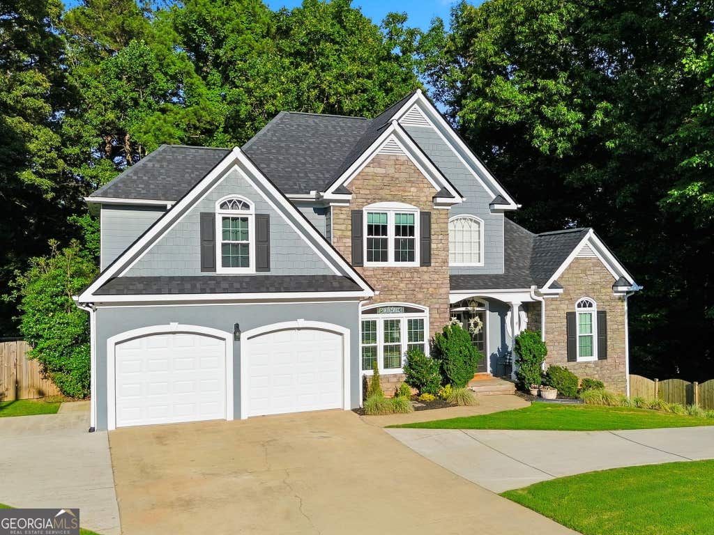 Photo of 406 Lovinggood Landing Drive, Woodstock, GA 30189 (MLS # 10823321)