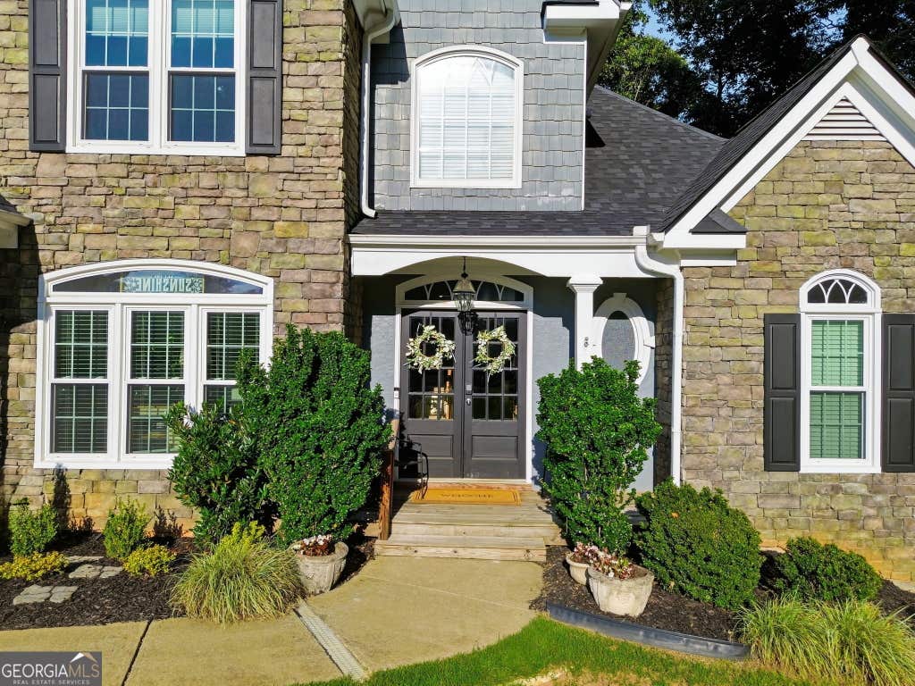 Photo of 406 Lovinggood Landing Drive, Woodstock, GA 30189 (MLS # 10823321)