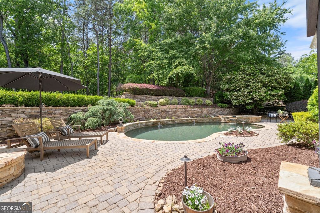 Photo of 6229 Grand Loop Road, Sugar Hill, GA 30518 (MLS # 10763791)