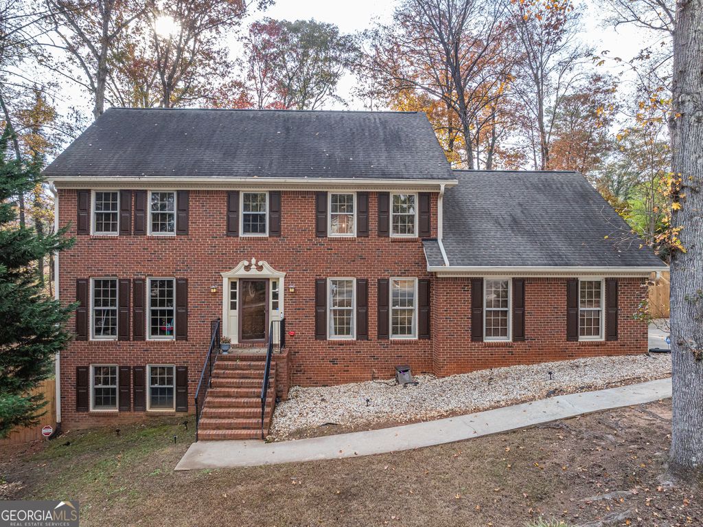 Photo of 2291 RODAO Drive SW, Lilburn, GA 30047 (MLS # 10648224)