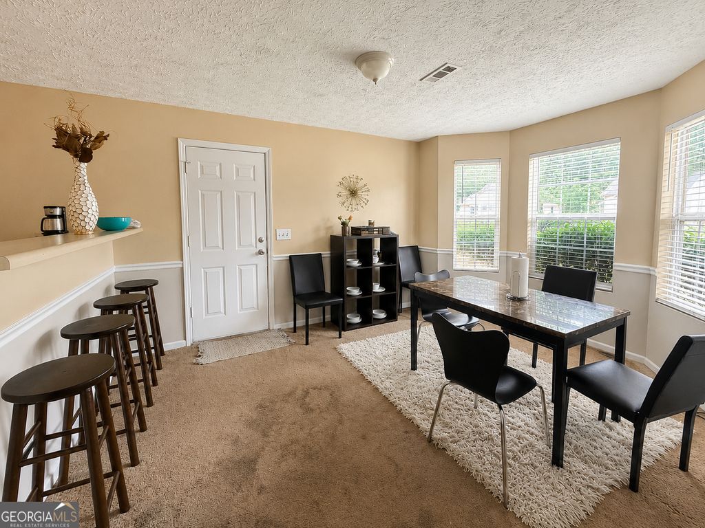 Photo of 207 Sequoia Pte RD, Carrollton, GA 30117 (MLS # 10803652)