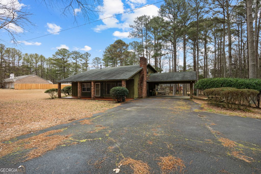 Photo of 447 Adams Rd, Fayetteville, GA 30214 (MLS # 10696070)