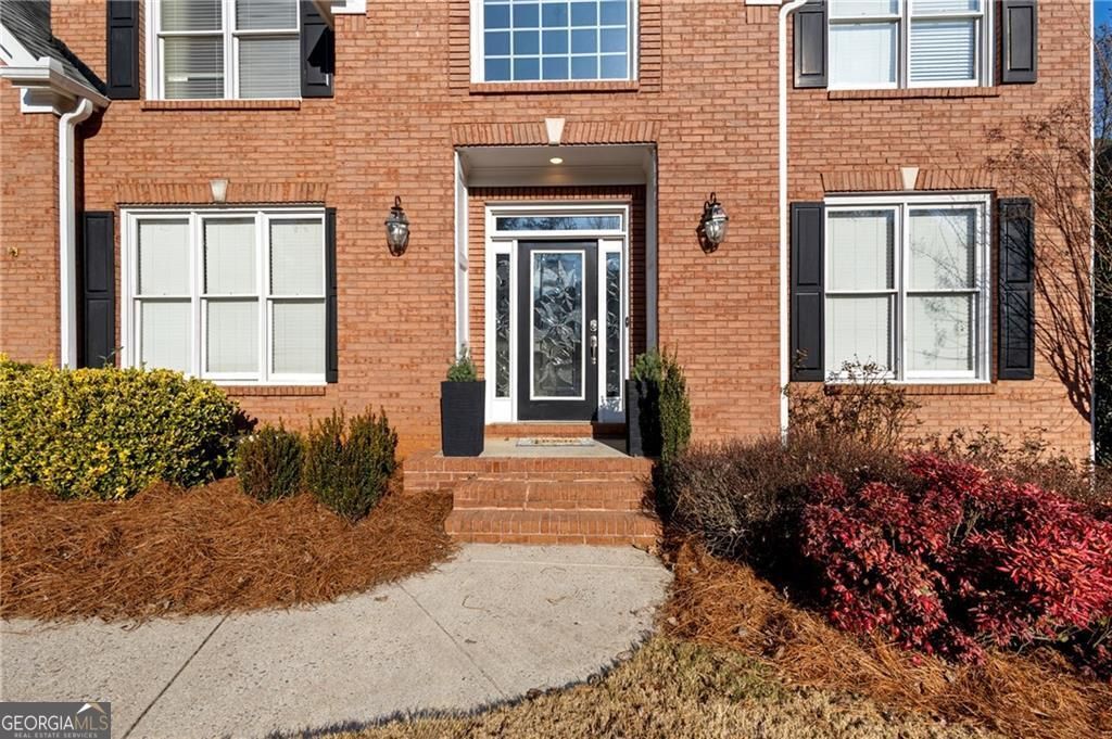 Photo of 1023 Hawk Creek Trail, Lawrenceville, GA 30043 (MLS # 10667482)