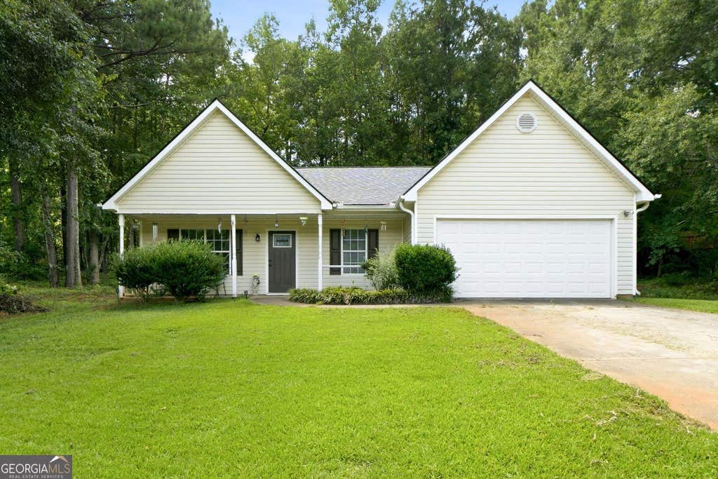 Photo of 315 Wild Turkey Lane, Locust Grove, GA 30248 (MLS # 10828382)