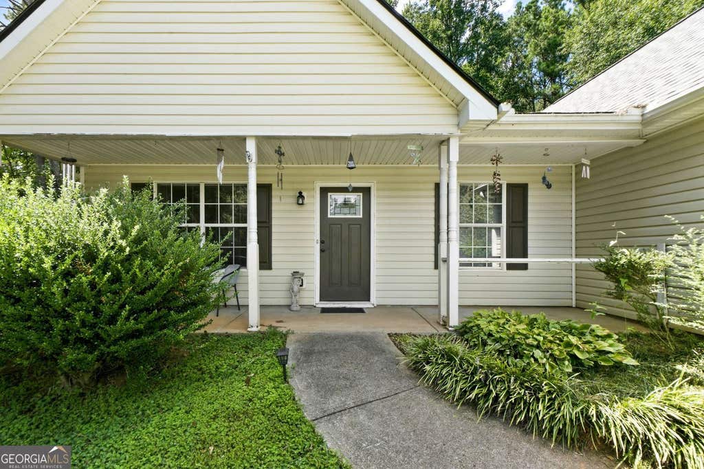 Photo of 315 Wild Turkey Lane, Locust Grove, GA 30248 (MLS # 10828382)