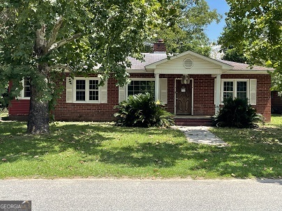 Brick home located on just outside of town. Great starter home or investor property